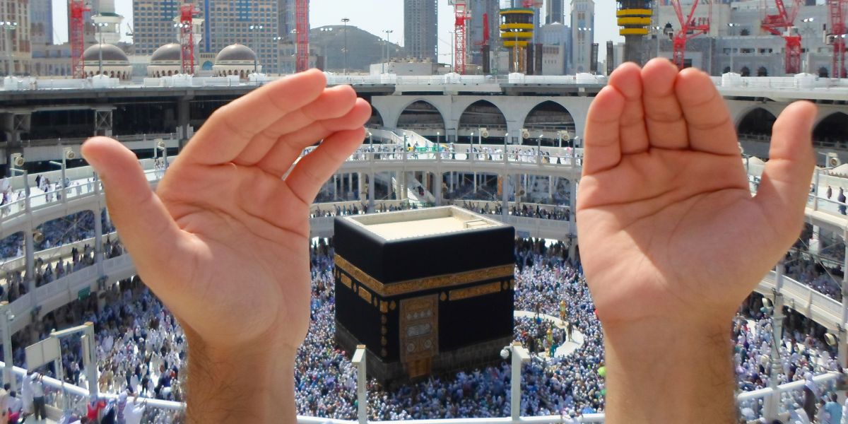 Pilgrims circle the Kaaba, highlighting the essential Umrah Visa Requirements for 2026 including Nusuk registration.